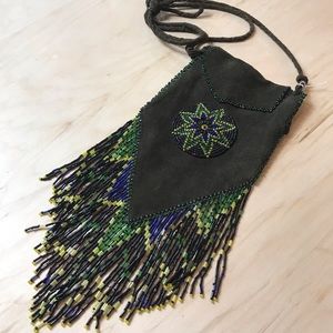 🌟 Vintage handmade leather and glass beaded bag.
